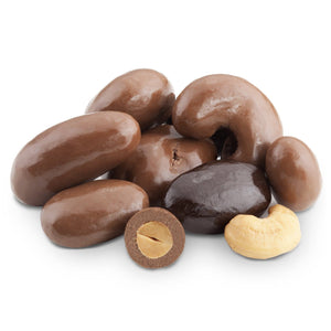 A pile of chocolate nuts on a white background.