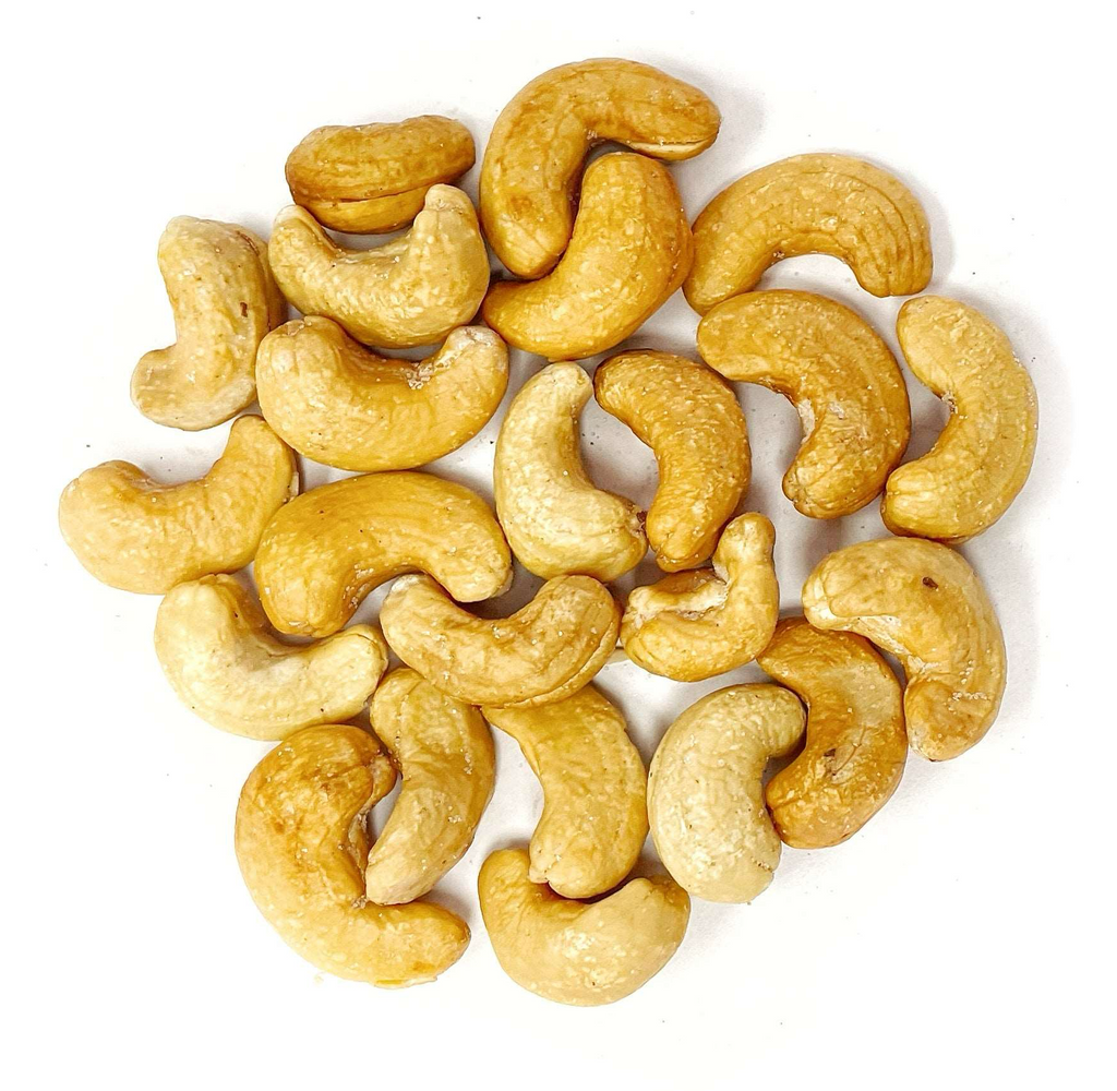 A handful of Roasted Unsalted Cashews, a delightful source of protein, elegantly arranged on a pristine white background.