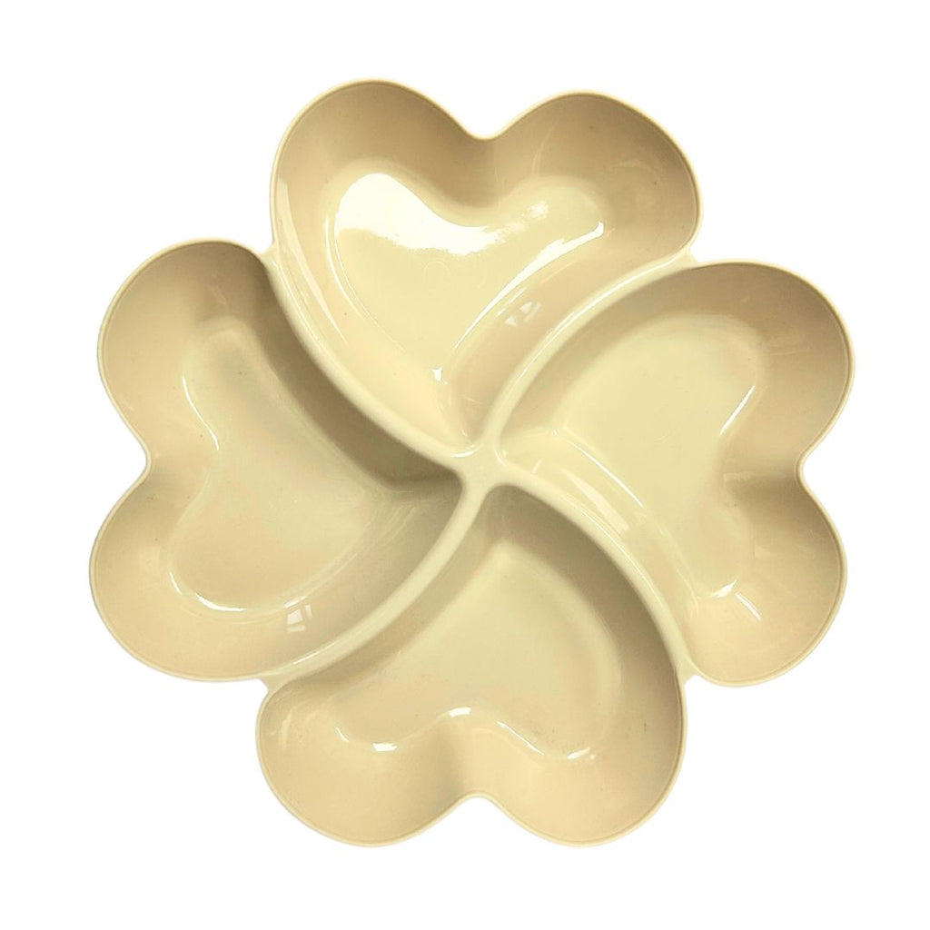 Introducing the Nuts Tray, a charming ceramic snack bowl designed with four heart-shaped compartments arranged in a delightful clover pattern on a pristine white background, ideal for serving party snacks or appetizers.