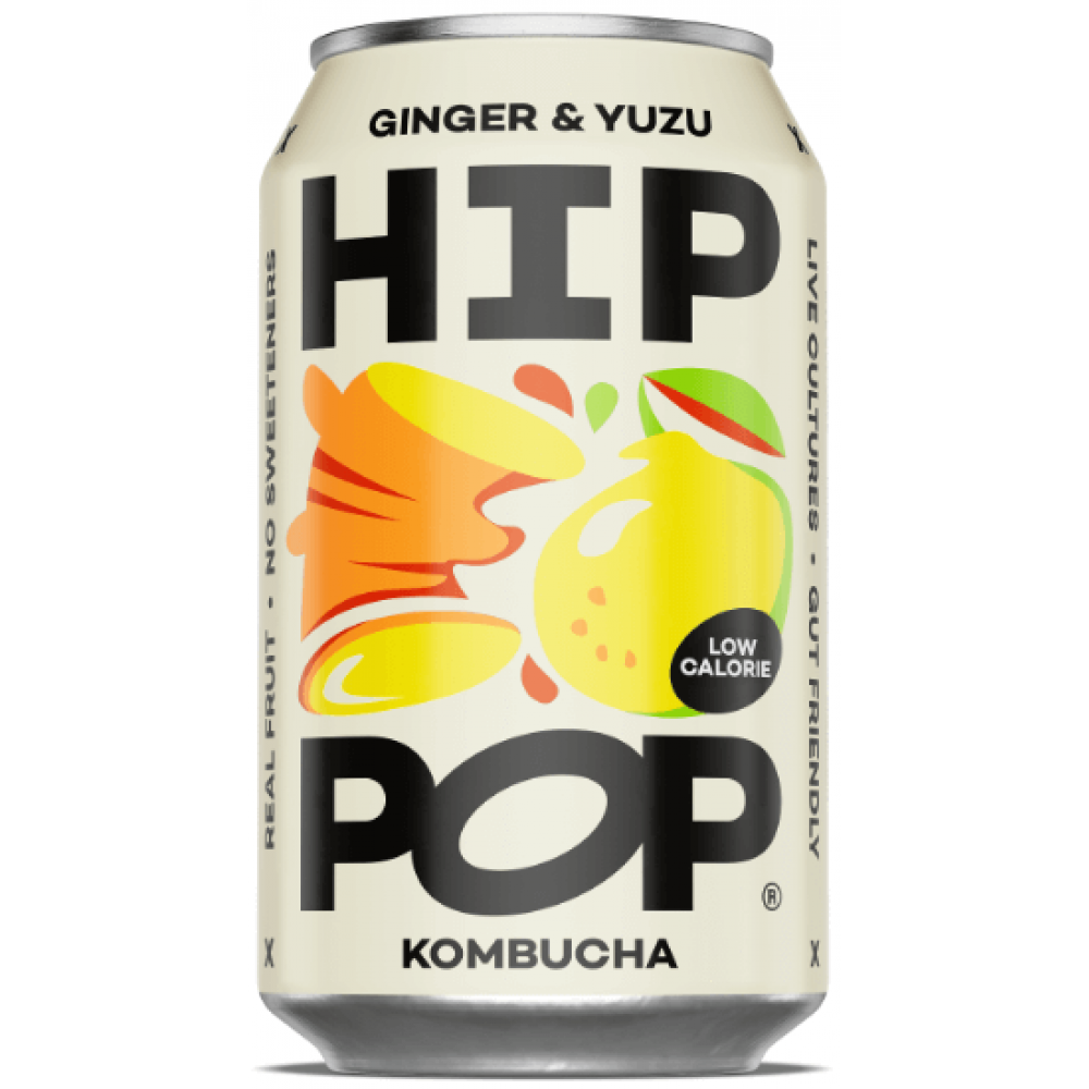 A 330ml can of Hip Pop Kombucha – Ginger & Yuzu, featuring bold black text and colorful fruit illustrations on a light background.