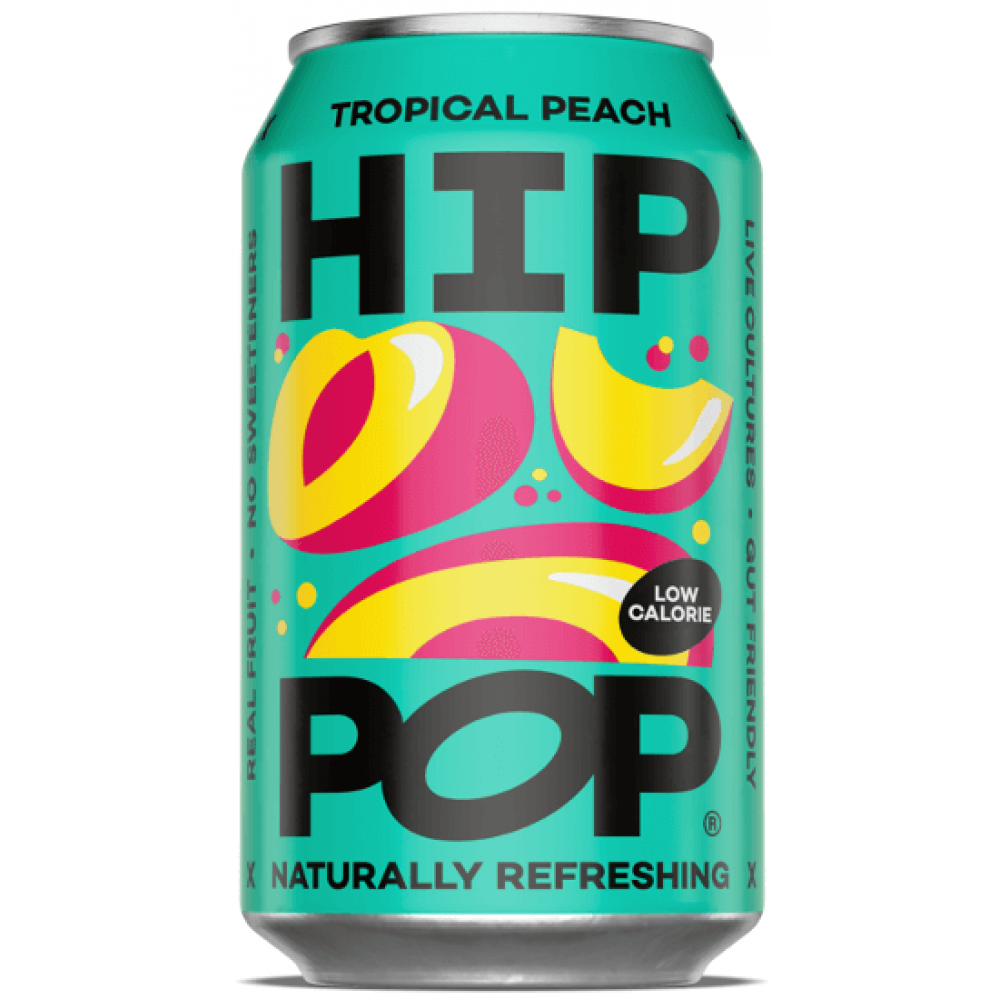 A turquoise can of Hip Pop Soda – Tropical Peach 330ml features bold black lettering, yellow and pink peach graphics, and claims like "naturally refreshing," "low calorie," and "with live cultures" for a delicious prebiotic soda.