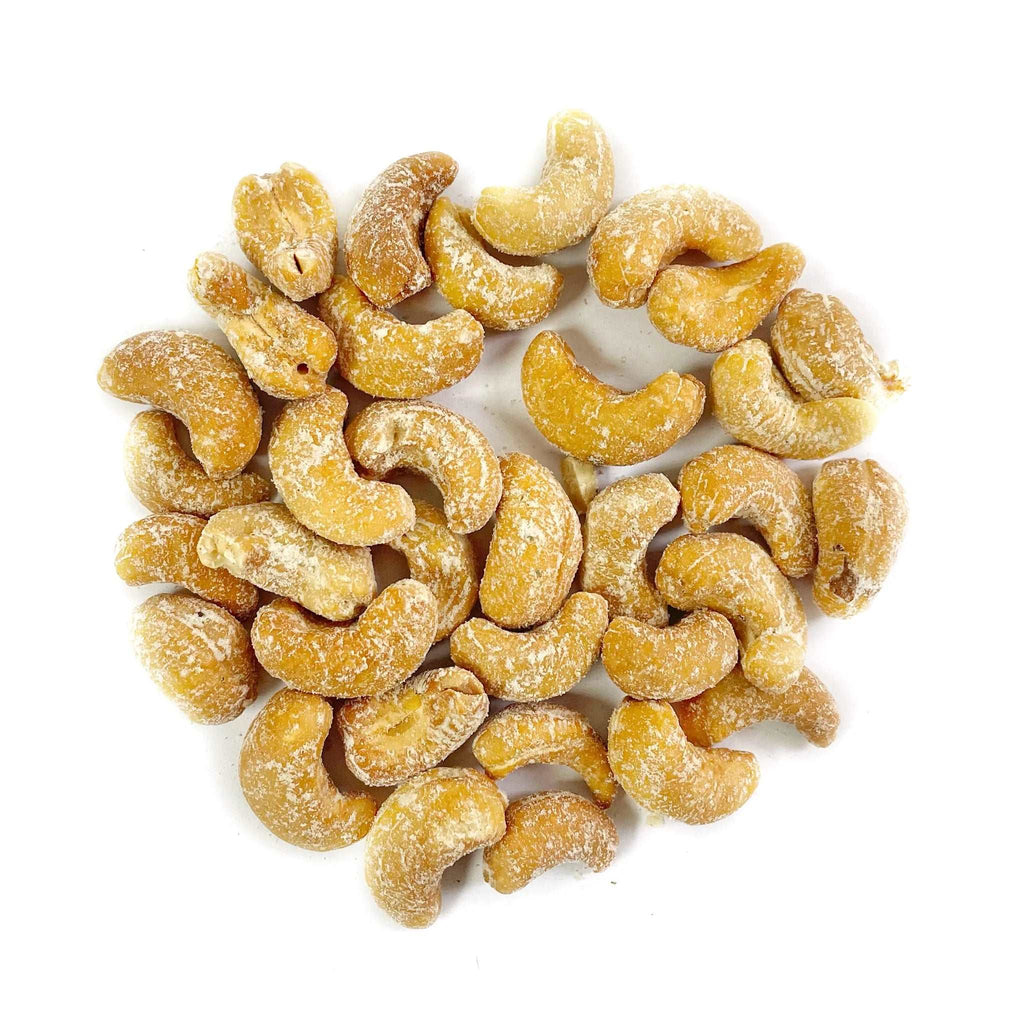 A pile of Smoked Cashews on a white background.