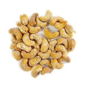 A pile of Smoked Cashews on a white background.