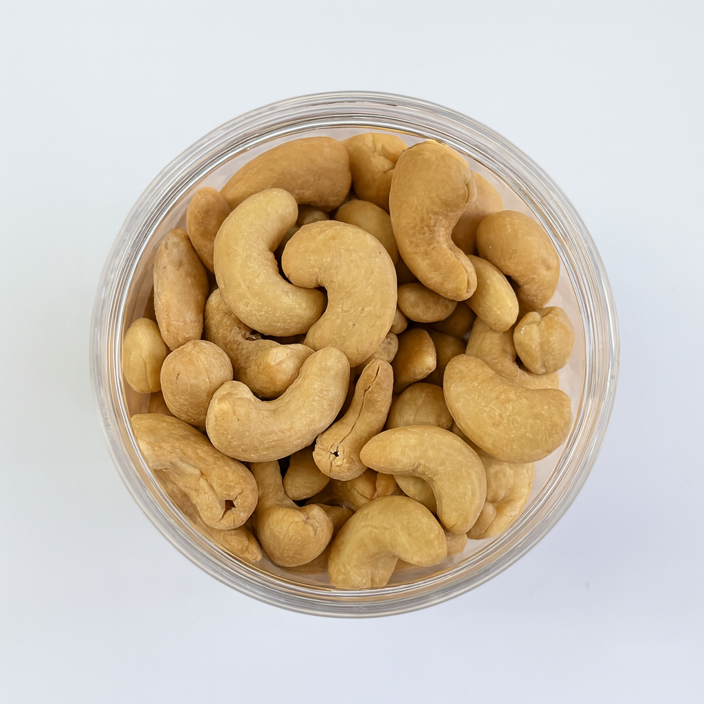 A clear jar of Roasted Salted Cashews (175g), shown from above on a white background—an ideal healthy snack.