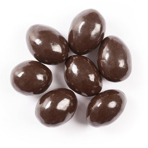 A pile of Belgian Dark Chocolate Brazil Nut on a white background.